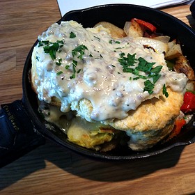 the kitchen sink three eggs scrambled with sausage crumbles cheese signature potatoes peppers and onions topped with homemade jumbo biscuit and - Colonial Cafe Kitchen Sink the kitchen sink three eggs scrambled with sausage crumbles cheese signature potatoes peppers and onions topped with homemade jumbo biscuit and - Colonial Cafe Kitchen Sink